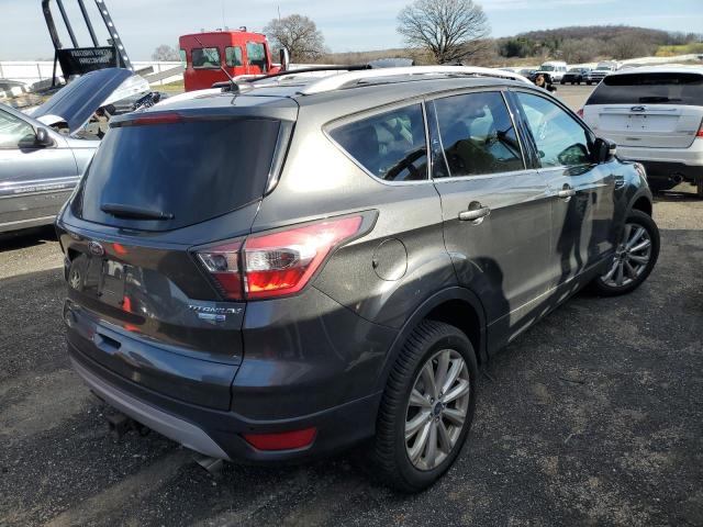 Photo 4 from auction – 2017 FORD ESCAPE TIT with VIN 1FMCU9J9XHUB43976
