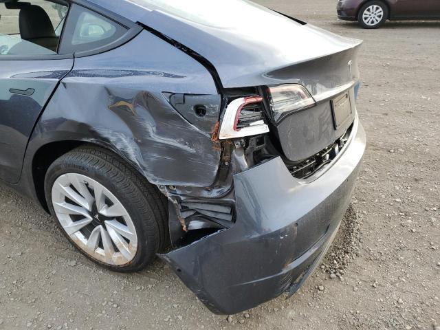 Photo 12 from auction – 2022 TESLA MODEL 3 with VIN 5YJ3E1EA2NF144938