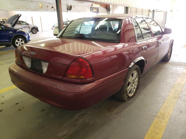 Photo 4 from auction – 2003 FORD CROWN VICT with VIN 2FAFP74W03X180508
