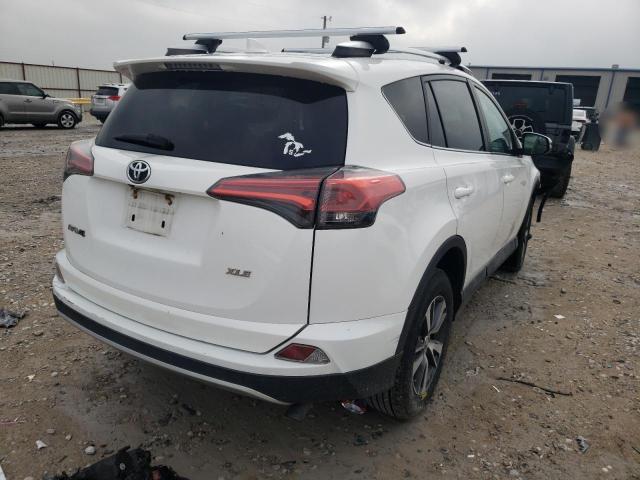 Photo 4 from auction – 2016 TOYOTA RAV4 XLE with VIN 2T3WFREV1GW248054
