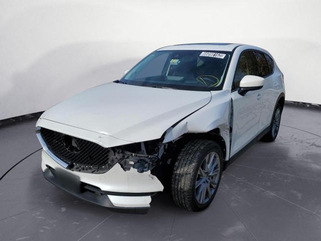 Photo 2 from auction – 2021 MAZDA CX-5 GRAND with VIN JM3KFBDM3M0378083