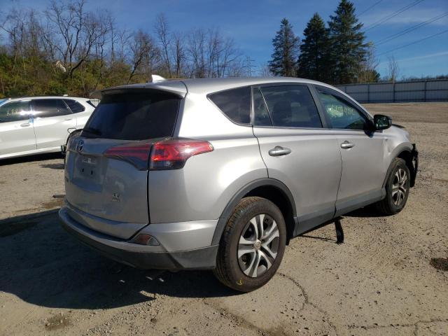 Photo 4 from auction – 2018 TOYOTA RAV4 LE with VIN 2T3BFREV0JW725756