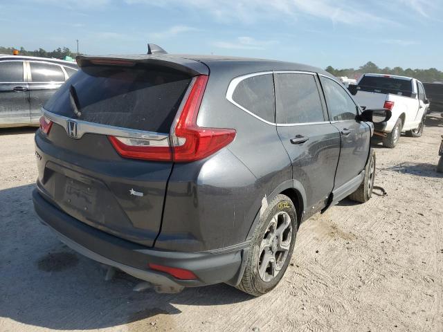 Photo 4 from auction – 2018 HONDA CR-V EX with VIN 7FARW1H54JE013174