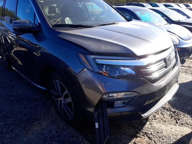 Photo 9 from auction – 2017 HONDA PILOT TOUR with VIN 5FNYF6H95HB028851