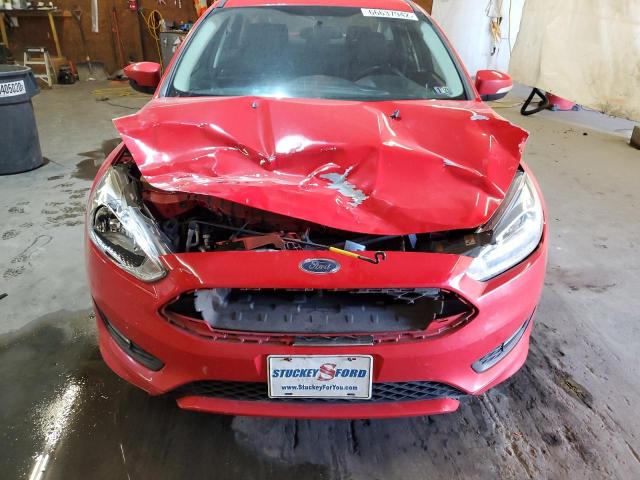 Photo 9 from auction – 2015 FORD FOCUS SE with VIN 1FADP3F20FL338146