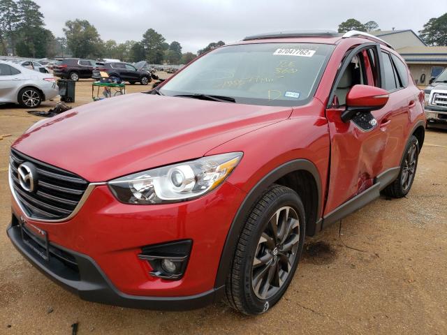 Photo 2 from auction – 2016 MAZDA CX-5 GT with VIN JM3KE2DY4G0683103