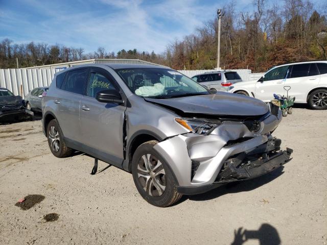 TOYOTA RAV4 LE 2018 with VIN 2T3BFREV0JW725756 - Photo from auction