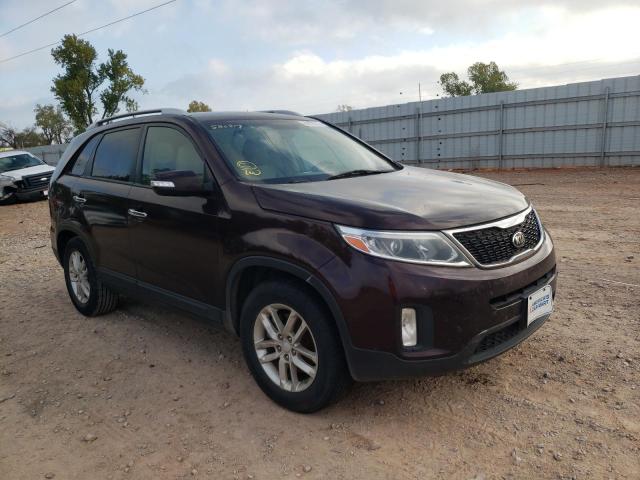 KIA SORENTO LX 2015 with VIN 5XYKTCA65FG586217 - Photo from auction