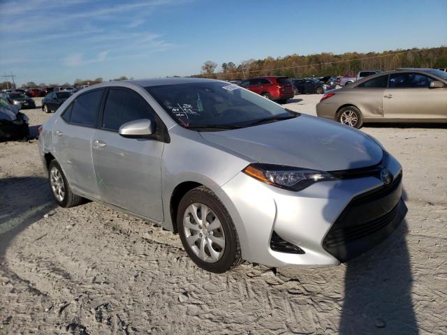 TOYOTA COROLLA L 2017 with VIN 5YFBURHE0HP701415 - Photo from auction