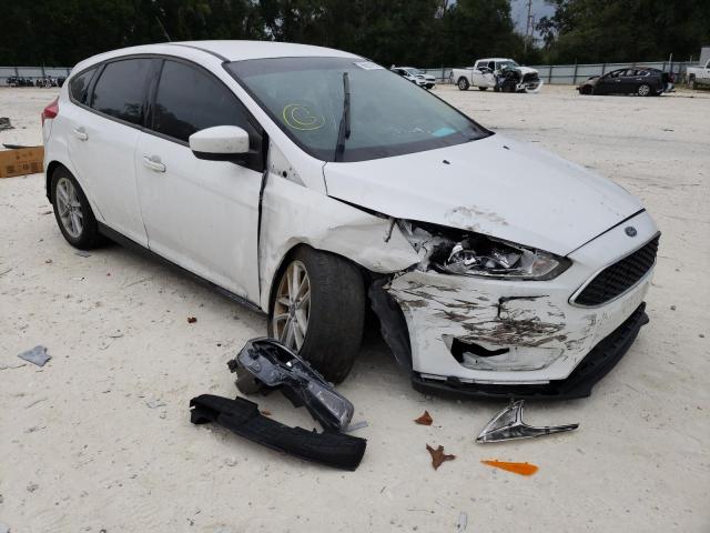 FORD FOCUS SE 2018 with VIN 1FADP3K28JL212311 - Photo from auction