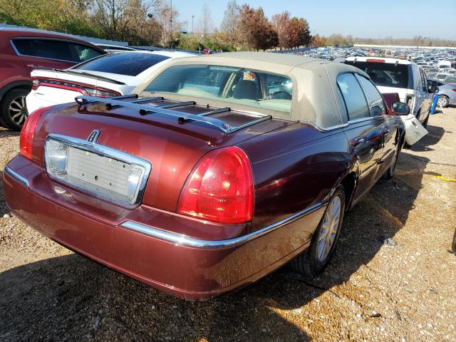 Photo 4 from auction – 2003 LINCOLN TOWN CAR E with VIN 1LNHM81W23Y617197