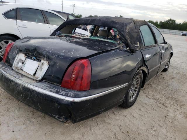 Photo 4 from auction – 2000 LINCOLN TOWN CAR C with VIN 1LNHM83W3YY928609