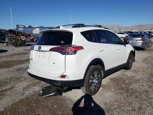 Photo 4 from auction – 2018 TOYOTA RAV4 LE with VIN JTMZFREV8JJ737862