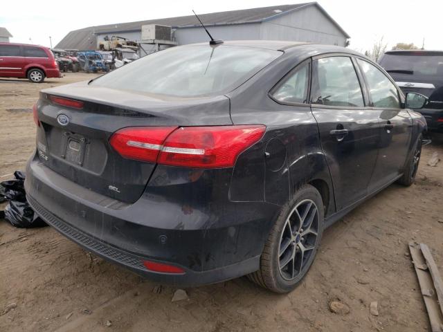 Photo 4 from auction – 2017 FORD FOCUS SEL with VIN 1FADP3H27HL209871