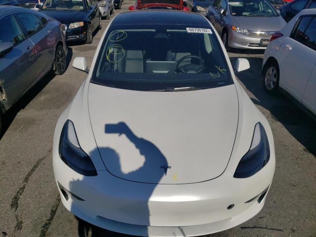 Photo 9 from auction – 2022 TESLA MODEL 3 with VIN 5YJ3E1EB7NF276781