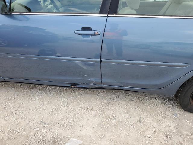 Photo 9 from auction – 2003 TOYOTA CAMRY LE with VIN 4T1BE32K13U669428