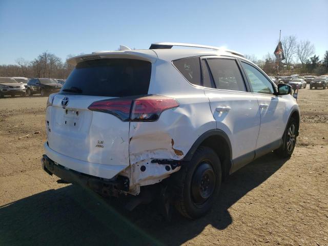 Photo 4 from auction – 2016 TOYOTA RAV4 LE with VIN 2T3BFREV4GW413061