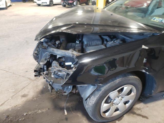 Photo 9 from auction – 2006 KIA OPTIMA LX with VIN KNAGE123565068414