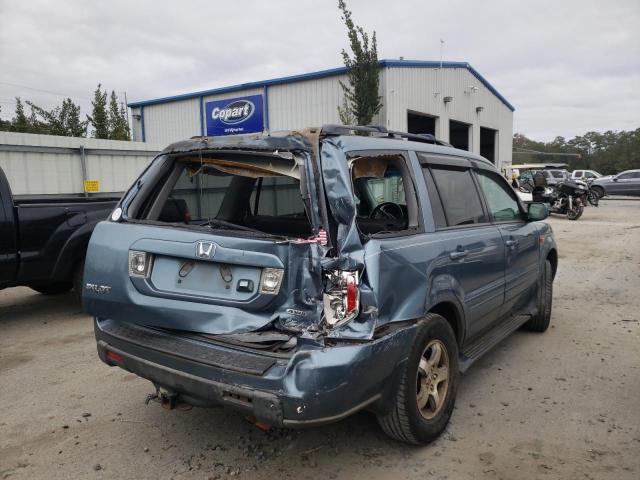 Photo 9 from auction – 2006 HONDA PILOT EX with VIN 2HKYF18756H501356