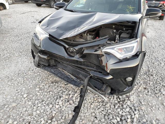 Photo 9 from auction – 2018 TOYOTA RAV4 SE with VIN 2T3JFREV0JW829319