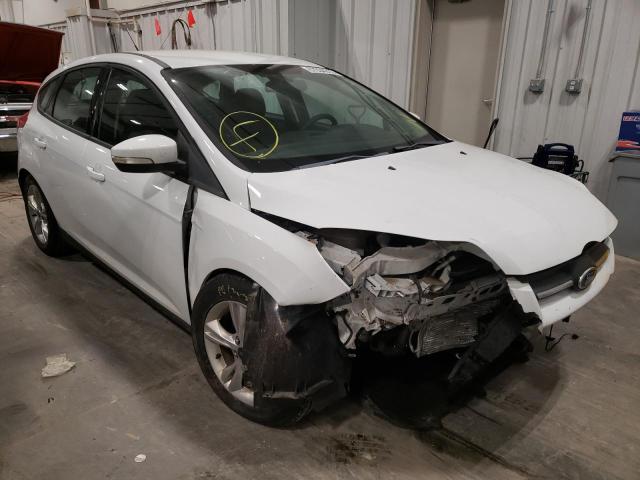 FORD FOCUS SE 2014 with VIN 1FADP3K25EL263058 - Photo from auction