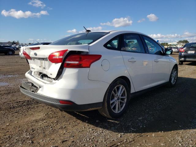 Photo 4 from auction – 2017 FORD FOCUS SE with VIN 1FADP3F24HL308876