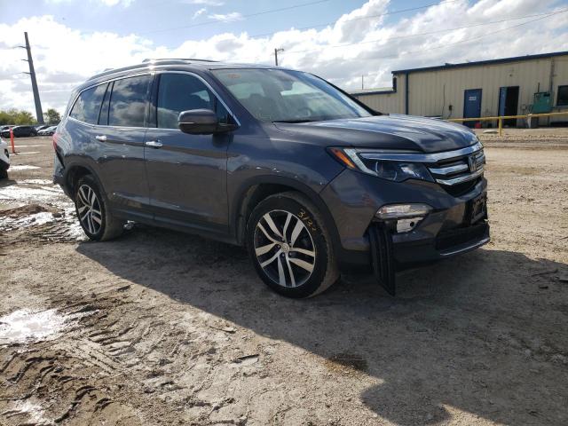 HONDA PILOT ELIT 2018 with VIN 5FNYF6H00JB004948 - Photo from auction
