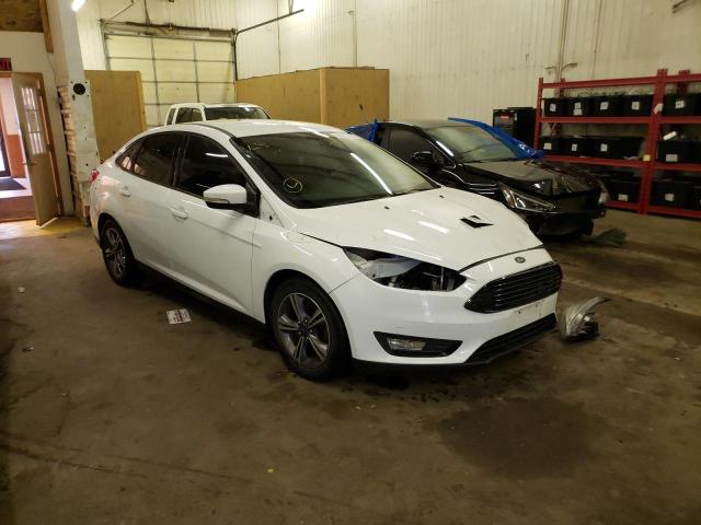 FORD FOCUS SE 2017 with VIN 1FADP3FE5HL308282 - Photo from auction