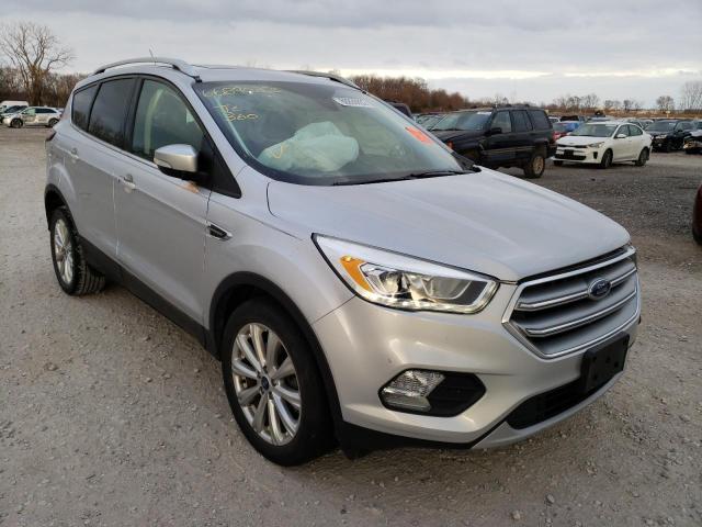 FORD ESCAPE TIT 2017 with VIN 1FMCU9J96HUD09104 - Photo from auction