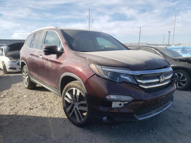 HONDA PILOT TOUR 2017 with VIN 5FNYF6H99HB022938 - Photo from auction