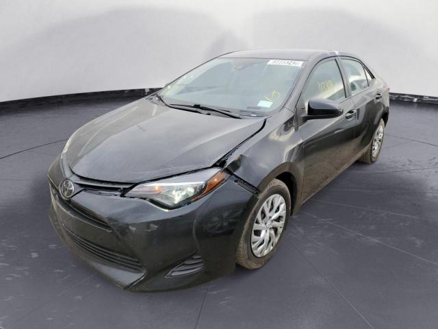 TOYOTA COROLLA L 2019 with VIN 5YFBURHE5KP909569 - Photo from auction