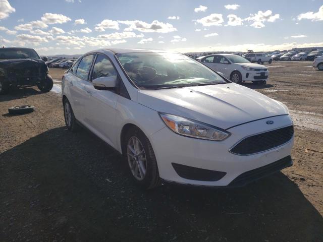 FORD FOCUS SE 2017 with VIN 1FADP3F24HL308876 - Photo from auction