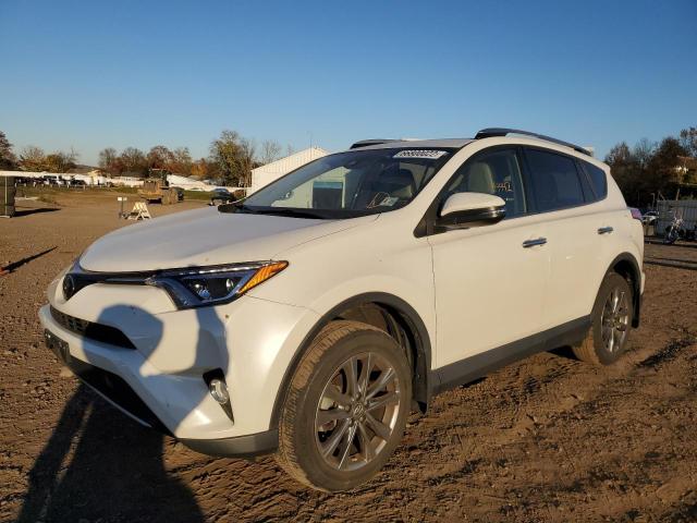 Photo 2 from auction – 2018 TOYOTA RAV4 LIMIT with VIN JTMDFREV0JJ736439