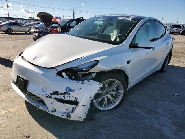Photo 2 from auction – 2021 TESLA MODEL Y with VIN 5YJYGDEE8MF074722