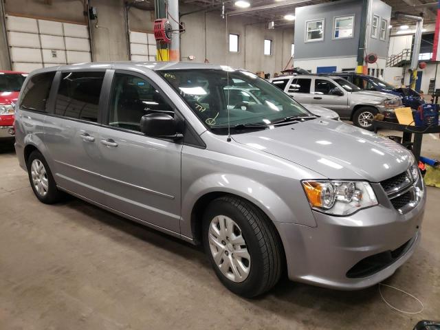 DODGE CARAVAN 2015 with VIN 2C4RDGBG1FR570702 - Photo from auction