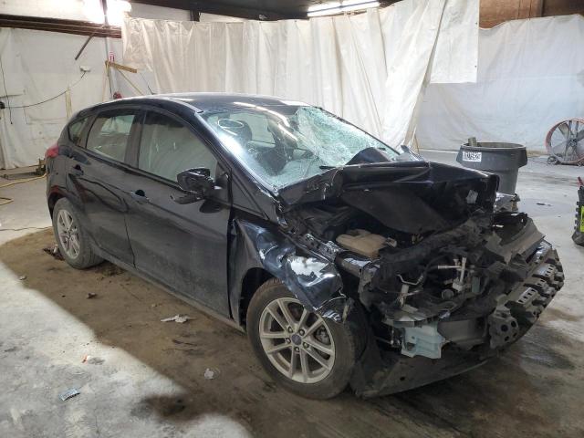 FORD FOCUS SE 2017 with VIN 1FADP3K2XHL276182 - Photo from auction