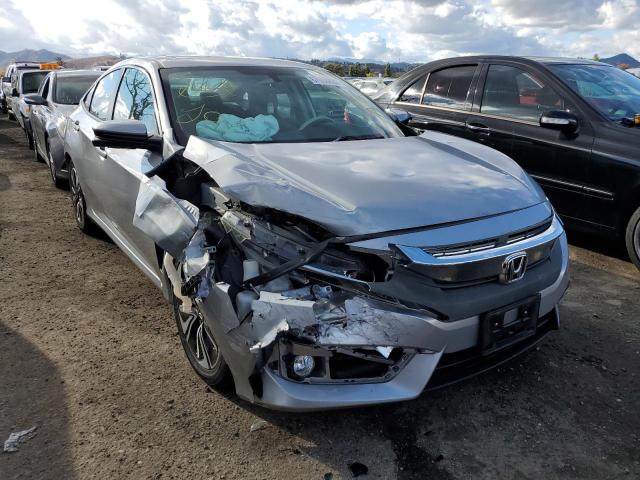 HONDA CIVIC EX 2017 with VIN 2HGFC1F32HH649252 - Photo from auction