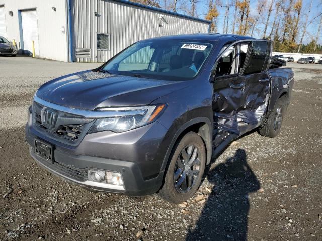 Photo 2 from auction – 2020 HONDA RIDGELINE with VIN 5FPYK3F74LB010918