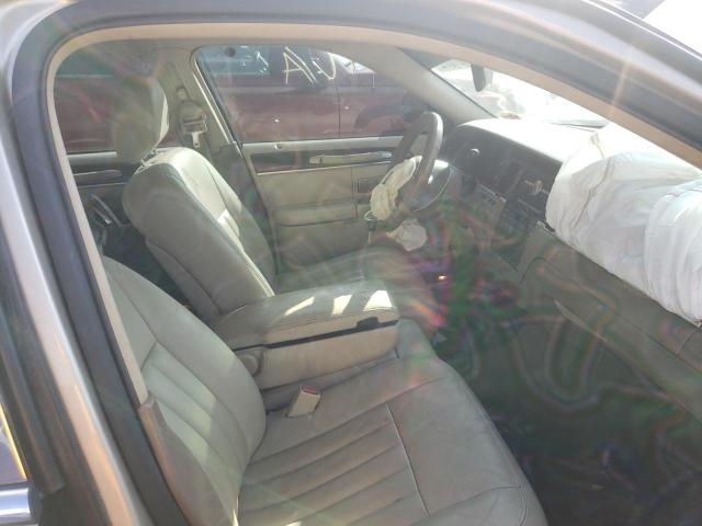 Photo 5 from auction – 2004 LINCOLN TOWN CAR E with VIN 1LNHM81WX4Y644391