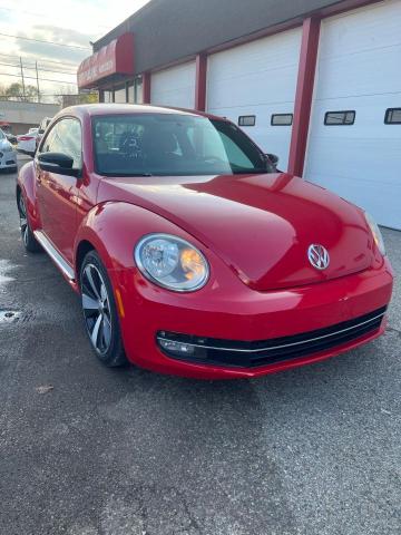 VOLKSWAGEN BEETLE TUR 2012 with VIN 3VW4A7AT6CM641670 - Photo from auction