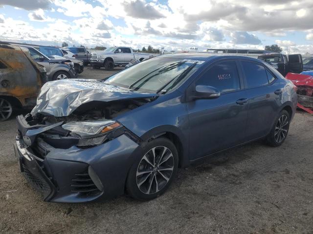 Photo 2 from auction – 2018 TOYOTA COROLLA L with VIN 5YFBURHE6JP801301
