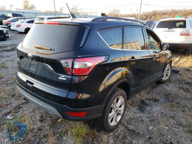Photo 4 from auction – 2018 FORD ESCAPE SE with VIN 1FMCU0GD1JUB06618