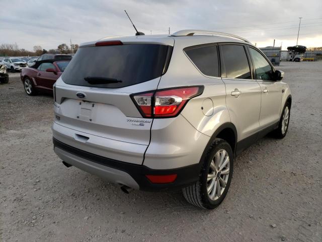 Photo 4 from auction – 2017 FORD ESCAPE TIT with VIN 1FMCU9J96HUD09104