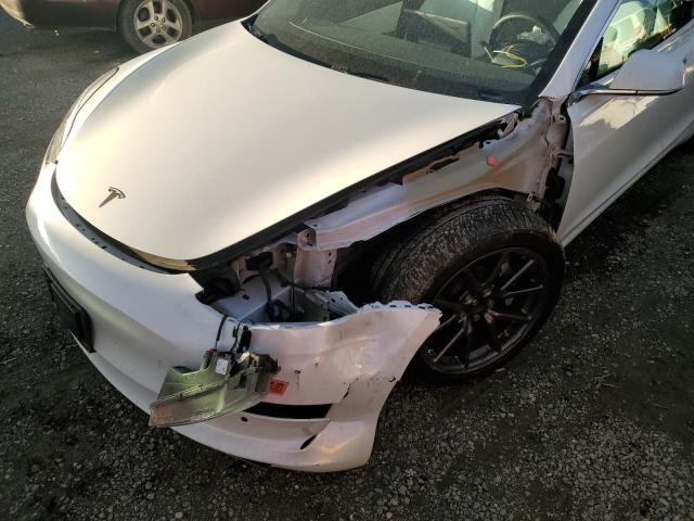 Photo 9 from auction – 2020 TESLA MODEL 3 with VIN 5YJ3E1EB1LF651657