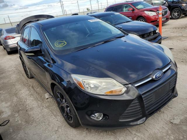 FORD FOCUS SE 2014 with VIN 1FADP3F20EL118326 - Photo from auction