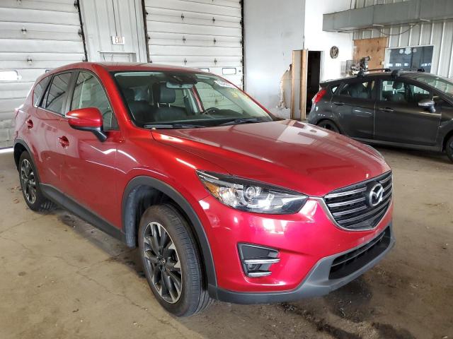 Photo 1 from auction – 2016 MAZDA CX-5 GT with VIN JM3KE4DYXG0701776