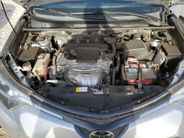 Photo 7 from auction – 2018 TOYOTA RAV4 LE with VIN JTMZFREV2JJ164649