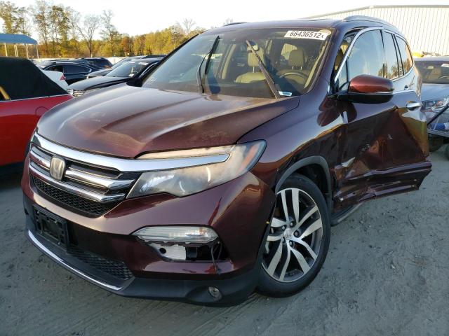 Photo 2 from auction – 2017 HONDA PILOT TOUR with VIN 5FNYF5H95HB002826