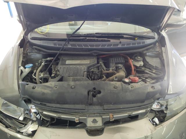 Photo 7 from auction – 2006 HONDA CIVIC HYBR with VIN JHMFA36216S009688
