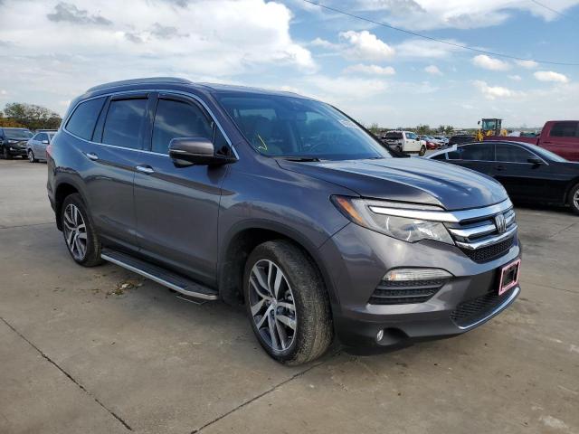 Photo 4 from auction – 2018 HONDA PILOT TOUR with VIN 5FNYF6H97JB024399